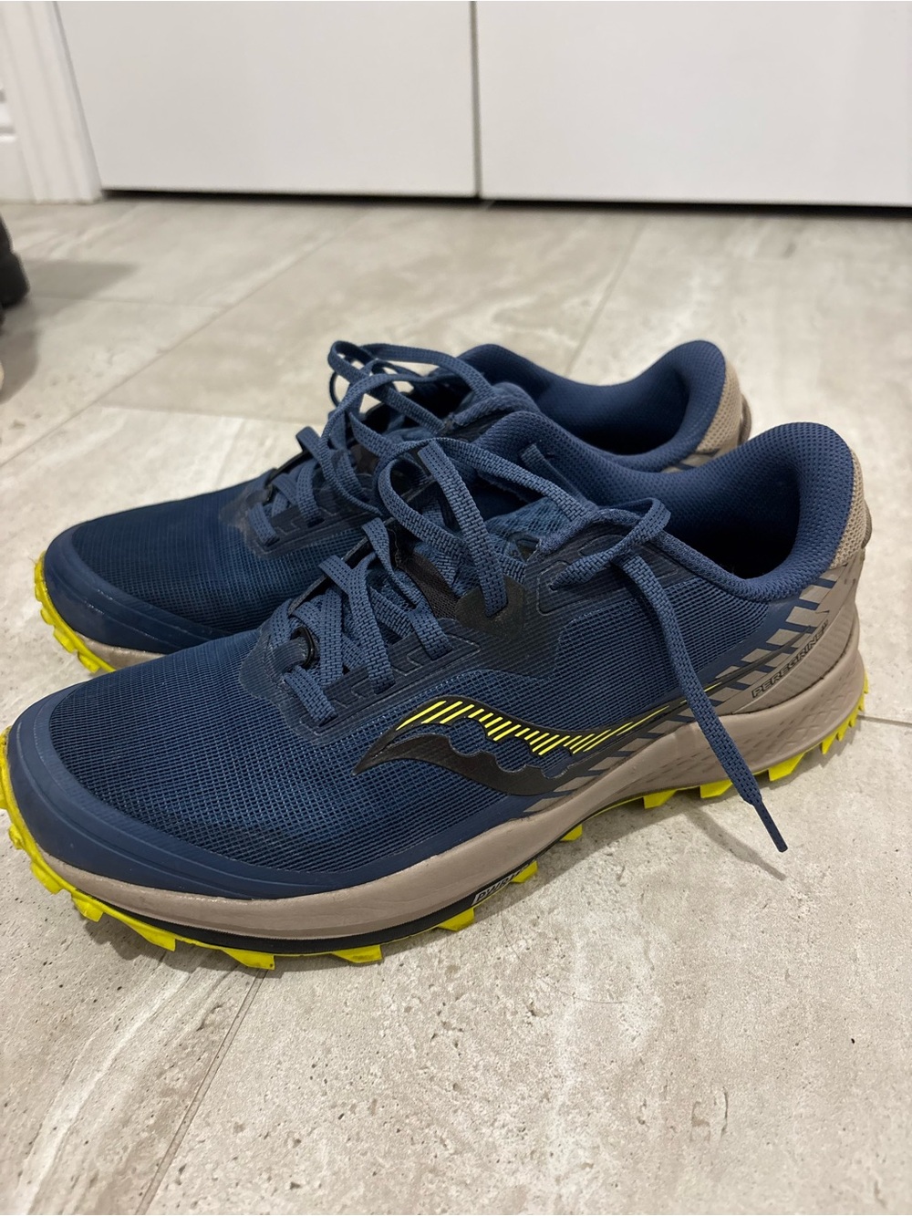 Saucony Navy Trail Running Shoes with Neon Yellow Accents